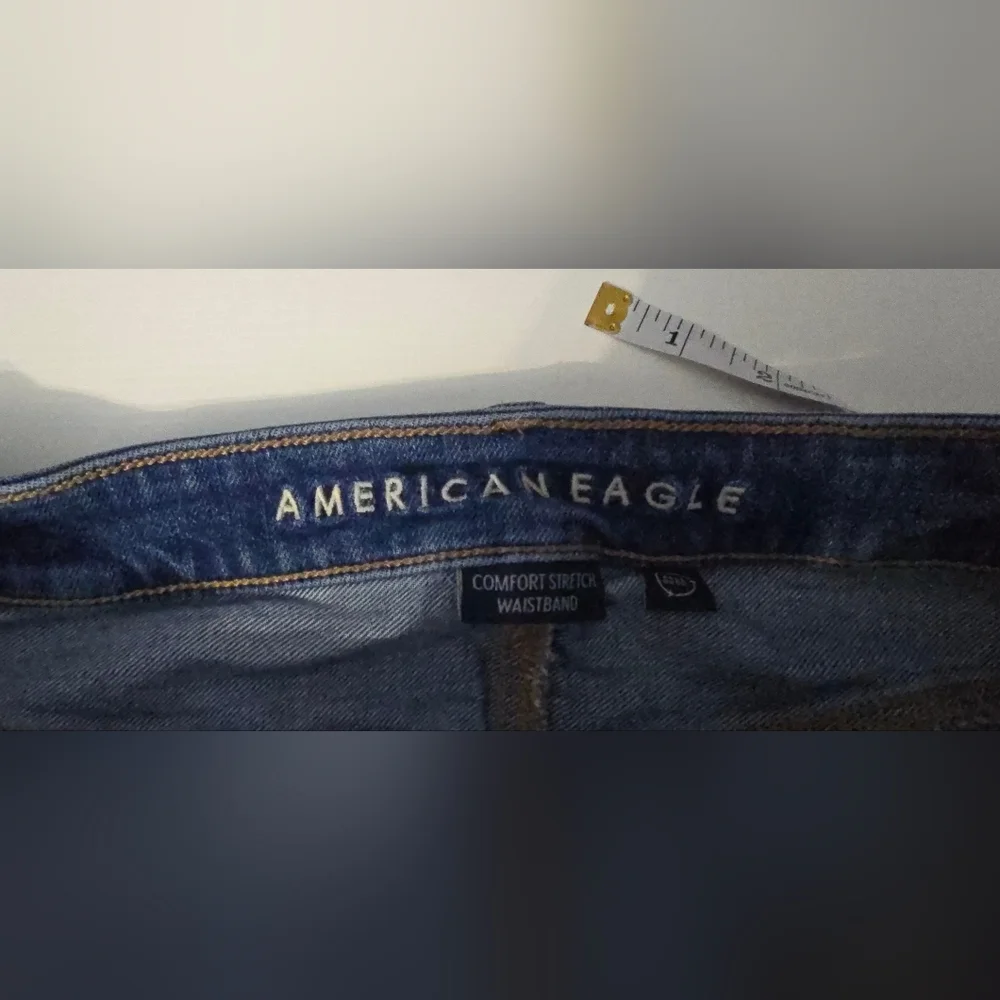 AE Dreamy Drape Strigid Low-Rise Ultra Wide-Leg Jean - Picture 5 of 10